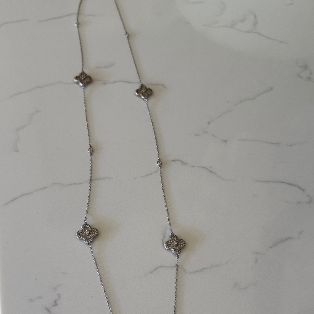 Elegant Silver Necklace with Floral Accents